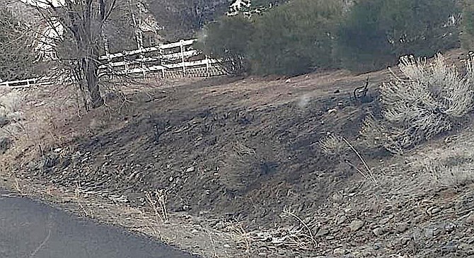Cody Lamb doused a small brush fire in the East Valley near Jones last week.