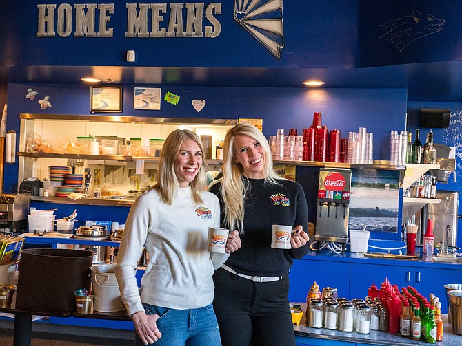 Shila Morris, left, and Kay Salerno, sisters and co-owners of Squeeze In restaurants, said they’ve learned a lot of lessons when it comes to running a business and constantly pivoting in 2020.