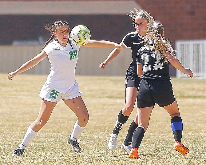 Fallon’s Zoey Jarrett tries to control possession against Spring Creek on Saturday.