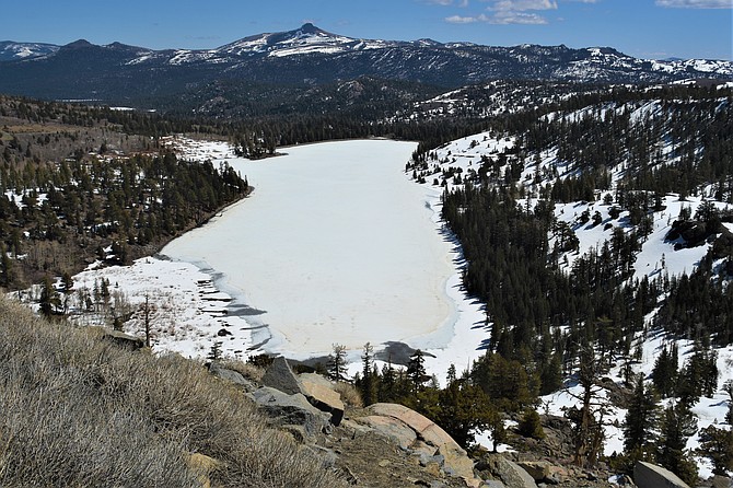 Red Lake above Hope Valley in Alpine County still has a layer of ice on it Saturday.