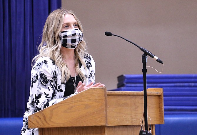 Brittany Witter, Eagle Valley Middle School seventh and eighth grade social studies teacher, accepts her award Tuesday at the Carson City School District’s Employee of the Year ceremony. (Photo: Jessica Garcia/Nevada Appeal)