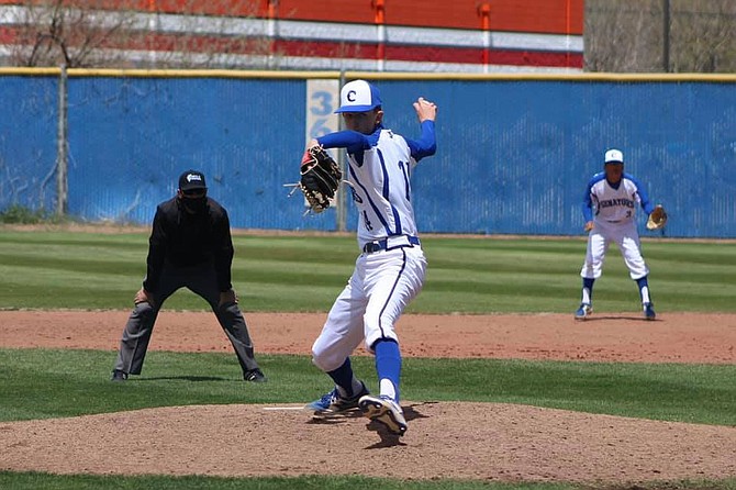 Senator pitcher Ryan Marquart winds up against Reno High over the weekend. Carson dropped both contests to the Huskies.