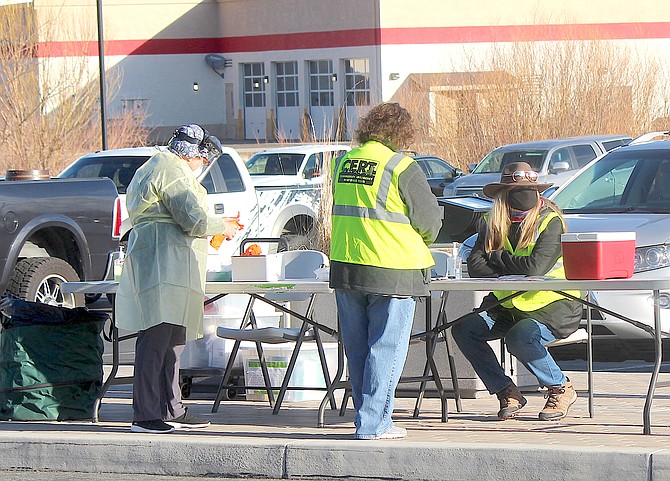 Members of Douglas County's Citizens Emergency Response Team and a health official wait for the first customers at a March 16 coronavirus testing in Gardnerville.