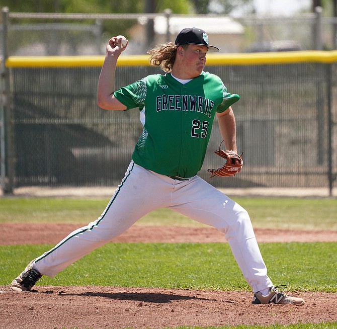 Fallon's Damien Towne pitches in the first game against the Spartans.