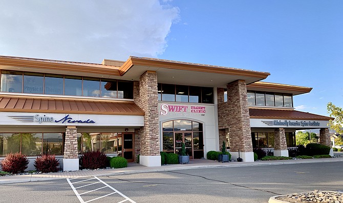 Exterior view of the Spine Nevada / Swift Urgent Clinic location at  9990 Double R Blvd. in Reno.