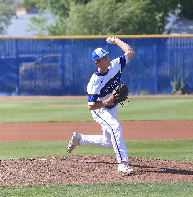 Justin Nussbaumer delivers a pitch Wednesday afternoon in a Class 5A Northern Nevada regional tournament elimination game. Nussbaumer was perfect through five innings as Carson staved off elimination.