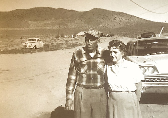 Walter Downs Sr. and Bessie M. Johnson Downs in the late 1950s. The homestead belonging to Walter Downs Jr. is visible in the background. The family moved to the Johnson Lane area and established homesteads.