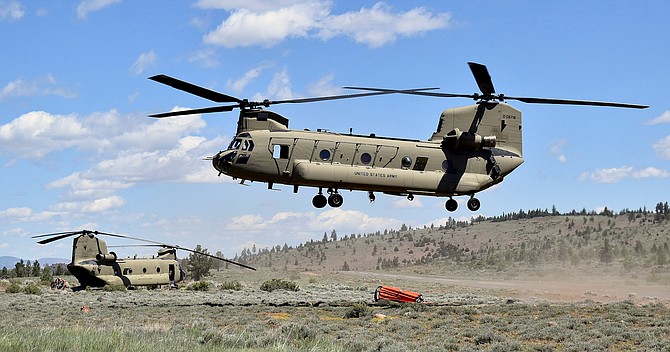 A  Nevada Army Guard Chinook helicopter lands at the Alpine County Airport as part of wildland firefighting training with the Nevada Division of Forestry on Tuesday.
