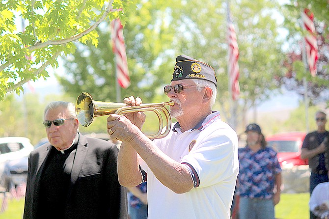 Leon Werner plays taps on Monday at Eastside Memorial Park's Memorial Day observance.