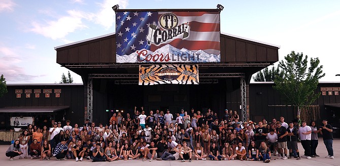 Members of the Douglas High School Class of 2021 gather for a group photo outside TJ's Corral on Thursday night during a Support Our Seniors party hosted by the Carson Valley Inn.