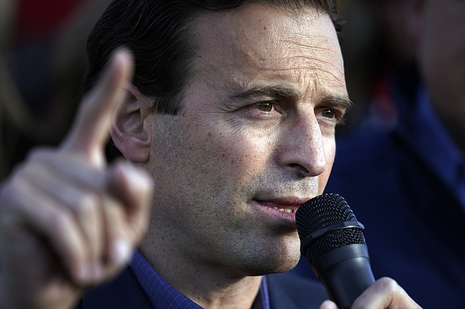Former Nevada Attorney General Adam Laxalt speaks during a news conference outside of the Clark County Election Department in North Las Vegas on Nov. 8. (Photo: John Locher/AP, file)