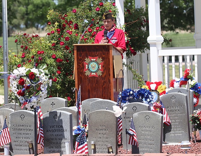 Commander Teri Korsma from Veterans for Foreign Wars Post 1002 in Fallon offers remarks at The Garden Funeral Home's veterans' section on Memorial Day.