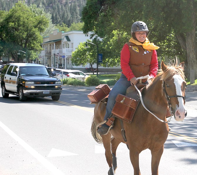 Aline Raabe rides north out of Genoa on her next two-mile leg of the annual Pony Express ride.
