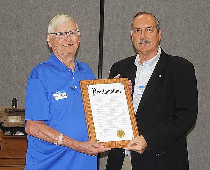 Mayor Ken Tedford, right, recognized former Councilman John Tewell as his 90th birthday in 2018.