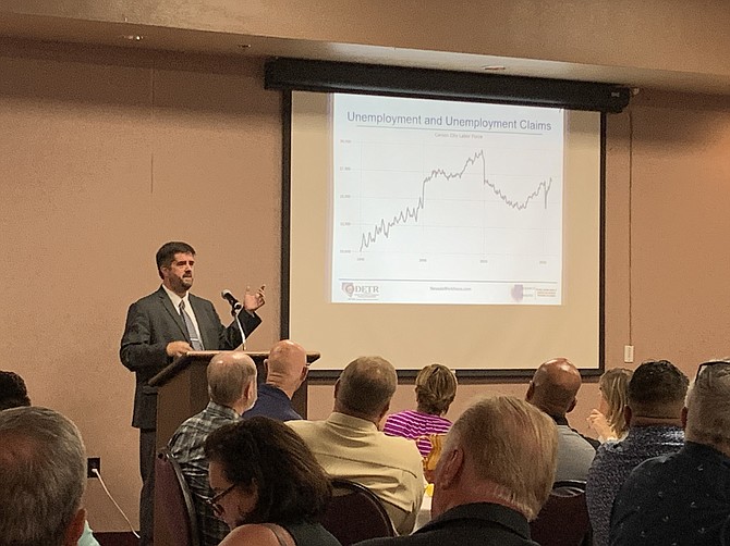 DETR chief economist David Schmidt reviews unemployment rates over time in Carson City.