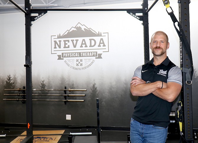 Jonathan Hodges, co-owner of Nevada Physical Therapy, stands inside the clinic’s new location at 1413 S. Virginia St. on June 25, 2021.
