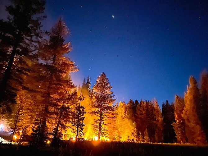 A night time photo of the Henry Fire burning in the Sierra wilderness southeast of Gardnerville. Sylvester Ruiz | U.S. Forest Service