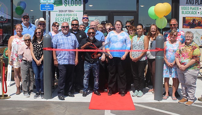 A ribbon cutting was conducted Friday for Golden Gate Petroleum’s Fallon facility. With the scissors is Nacho Aguilar, director of retail, Nevada/California, and to his right is District Manager Myron Johnson.