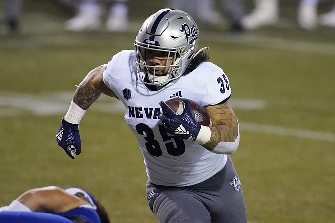 Nevada running back Toa Taua shown against San Jose State on Dec. 11, 2020, in Las Vegas. (Photo: John Locher/AP, file)