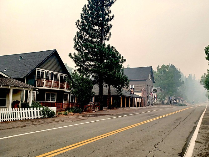 Photographer JT Humphrey took this photo of downtown Markleeville on Sunday. Saving the historic town of 200 is a priority for firefighters battling the Tamarack Fire. A slide show of Humphrey's photos is located at https://youtu.be/Nt-n6NjnrmQ