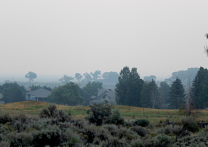 The sun is nowhere to be found this morning in Genoa as a smoky pall hangs over Carson Valley.