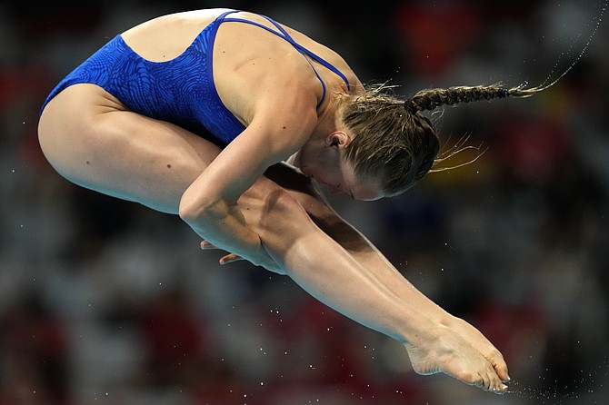 Krysta Palmer of the United States' competes in women's diving 3m springboard final at the Tokyo Aquatics Centre at the 2020 Summer Olympics, Sunday, Aug. 1, 2021, in Tokyo, Japan. (AP Photo/Dmitri Lovetsky)