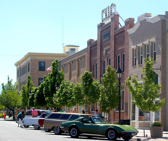 Classic cars park on Esmeralda Avenue in front of the CVIC Hall in Minden on Thursday.