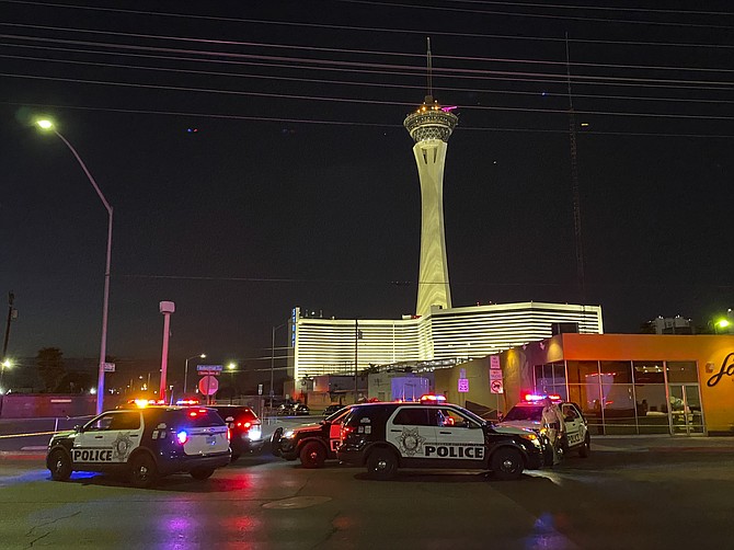 Las Vegas police investigate a shooting on Chicago Avenue in Las Vegas on Tuesday, Aug. 10, 2021. (Glenn Puit/Las Vegas Review-Journal via AP)