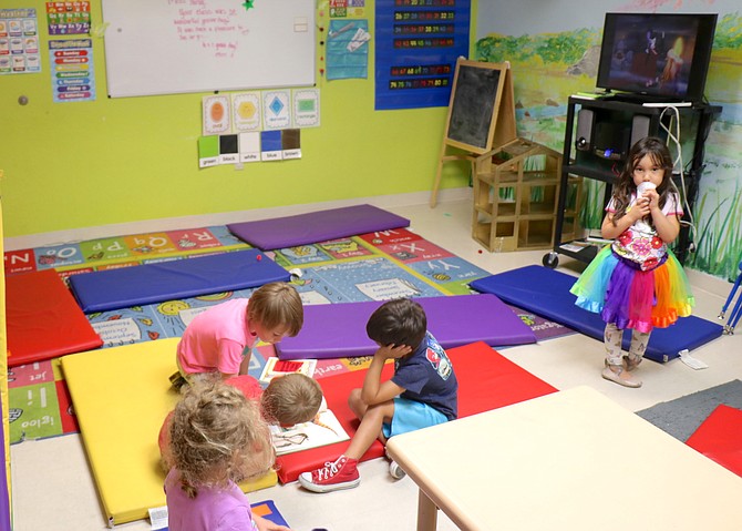 Children interact in a classroom at Crosswalk Preschool in Northwest Reno on Friday, July 23.