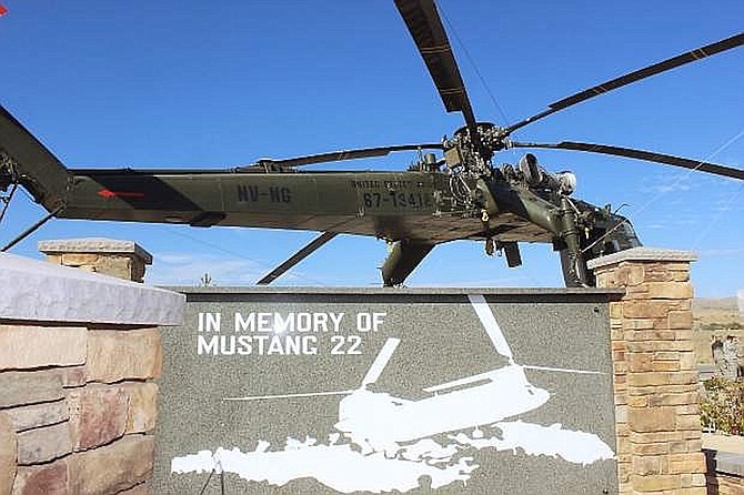 Two Nevada Guardsmen — Chief Warrant Officer 2 John M. Flynn of Sparks and Sgt. Patrick Stewart of Sparks (formerly of Fernley) — along with three other soldiers —Warrant Officer Adrian B. Stump and Sgt. Tane T. Baum, both of Pendleton, Ore., and Sgt. Kenneth G. Ross of Peoria, Ariz. — died when their CH-47 was shot down in Afghanistan in September 2005. A memorial stands in their honor at the Nevada Army National Guard’s Army Aviation Support Facility at Stead. (Photo: Steve Ranson/LVN)