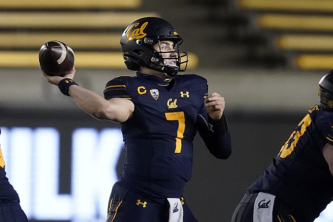 California quarterback Chase Garbers throws a pass against Oregon on Dec. 5, 2020 in Berkeley, Calif. The California Golden Bears are excited to show off what they hope will be a much more dynamic offense with respected longtime NFL coordinator Bill Musgrave and veteran quarterback Garbers. (AP Photo/Jeff Chiu, file)