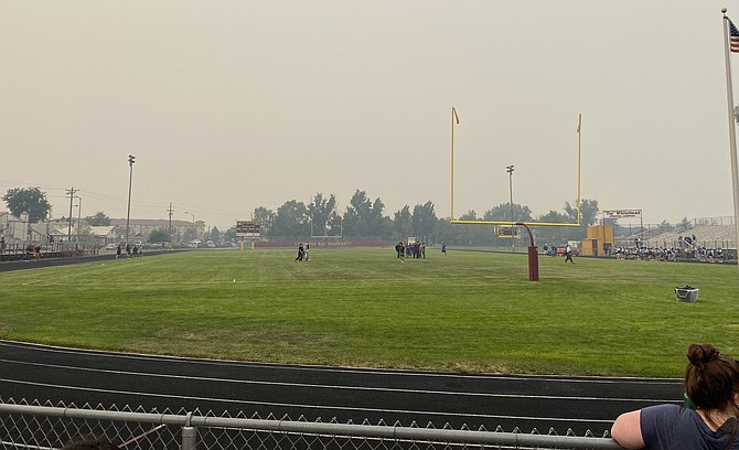 The smoke over Sparks High School football field Friday afternoon.