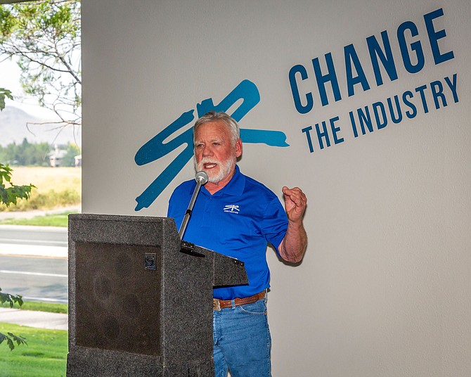 Scott Loughridge, CEO of SR Construction, speaks at the grand opening of the company's Reno office on Aug. 12.
