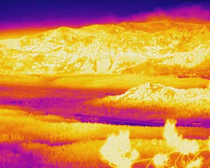 The thermal camera atop the Heavenly Mountain Resort at South Lake Tahoe, California gives firefighters the ability to see through thick smoke that otherwise keeps them from tracking fire progress directly ahead of the fire. The photo shows the view on Saturday, Aug. 28 at 6 a.m. (Photo: University of Nevada, Reno)
