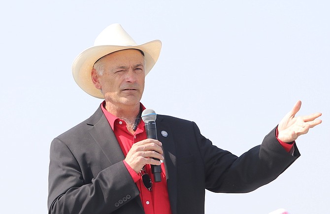 Then-State Sen. James Settelmeyer attending a Basque Fry at the Corley Ranch.