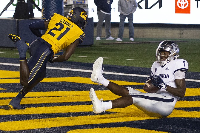 Nevada wide receiver Romeo Doubs makes a touchdown reception behind California cornerback Collin Gamble in the second quarter Saturday, Sept. 4, 2021, in Berkeley, Calif. (AP Photo/D. Ross Cameron)