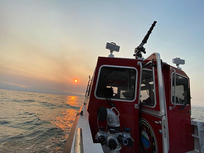 The Tahoe Douglas Fire Protection District fire boat patrols the Lake during the Caldor Fire.