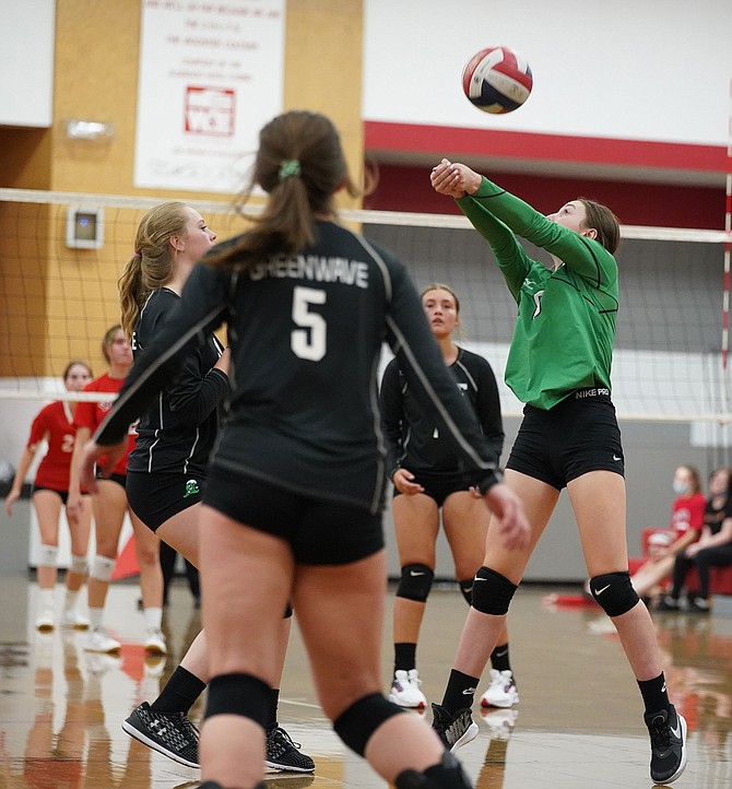 Fallon’s Bailey Stritenberger passes to ball to one of her teammates in last Monday’s game against Wooster in Reno.