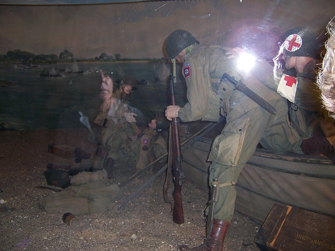 A member of the 82nd Airborne Division is about to enter a canvas Goatley boat. Normally used by engineers to build bridges, the ‘troopers’ of the 82nd crossed the Waal River in Goatley boats. They didn't have enough paddles. Many troopers used the butt of their M-1 rifles to paddle.