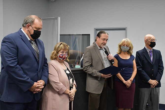Supervisor Maurice White reads a proclamation by the board Thursday to recognize Constitution Day on Sept. 17.