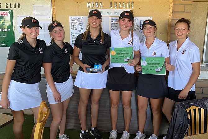 The Douglas High School girls' golf team poses for a photo after winning its third straight event this season.