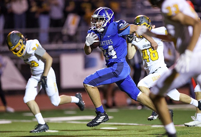 Carson High's Ben Heaton (34) runs into the end zone against Galena last week. Heaton had a receiving touchdown in Carson's 17-13 win over Reed Friday night.