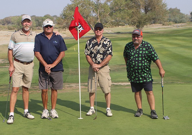 The Cushing team finished first in the second annual Greenwave Hall of Fame Golf Tournament.