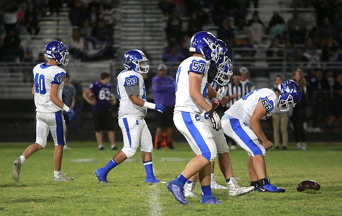 Carson High’s offensive line sets up prior to a snap against Spanish Springs last Friday. Sean Finn (57), Franco Munoz (66), Diego Aldana (53), Mack Chambers (40) and the rest of the Senator line will hope to re-establish the run for Carson this Friday.