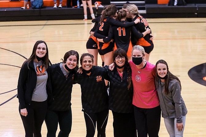 A group of Douglas High coaches pose for a photo prior to the Tigers game against Carson. Pictured from left to right are assistant coaches Keely Latham, Brenna White, Mysta Townsell, head coach Suzi Townsell, Jill Couwenhoven and Montrashay Worley.