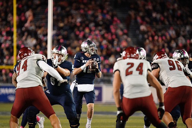 Nevada's Carson Strong looks to pass against NMSU.