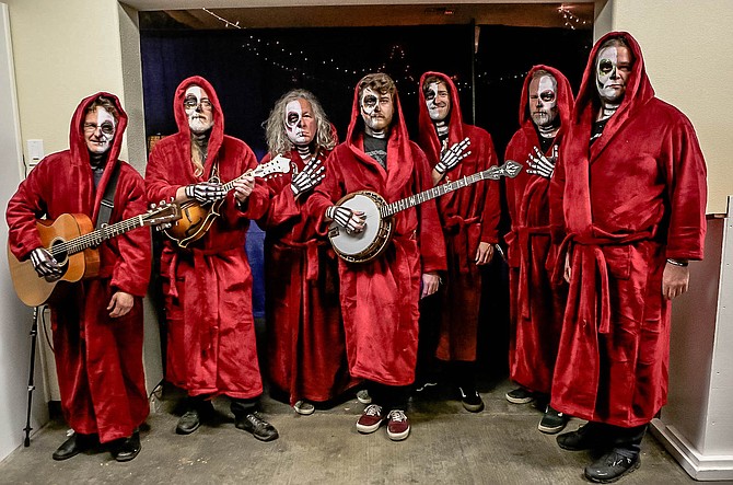 Railroad Earth shows off their costumes before going on stage in 2019. (Photo: Susan J. Weiand)