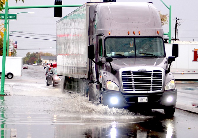 Water from Friday’s rainstorm pooled up along curbs throughout certain parts of Fallon.