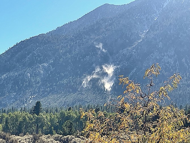Resident Charles Voss captured the dust from a landslide on Jobs Peak that occurred on Thursday afternoon.