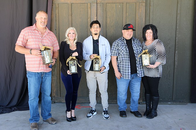The 2021 Spotlight Award winners, from left: Keith Hart (Big Daddy’s Bike, Ski & Brew), Tiffany Sargent (Lucky Beaver Bar & Burger), Mario Lobatos (Anytime Fitness – Gardnerville) and Ben and Amber Larimer (CoCoMoes).